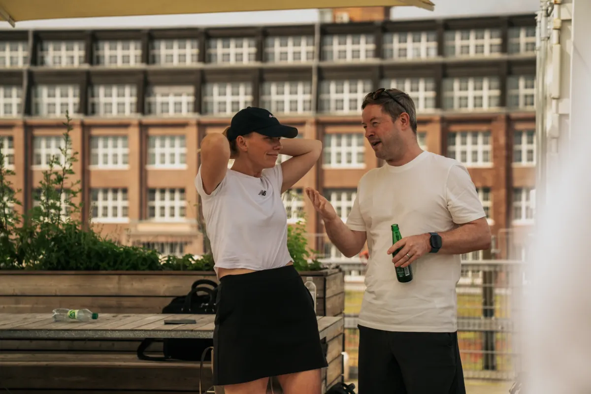 Partner Marcus Love chatting with an investor at the Love Ventures Padel in Berlin